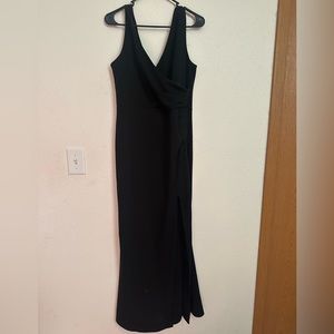 Black maxi dress, wrap low cut top, slit up to thigh on left side